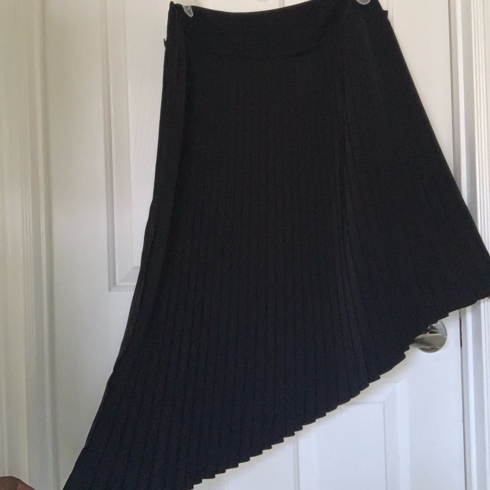 Asymmetrical black pleated skirt